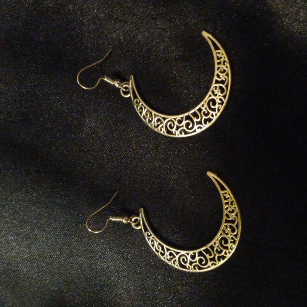 Filigree style crescent moon earrings.